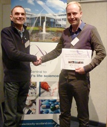 Ian Webster Managing Director BioCity Scotland with winner Nick Gilbert